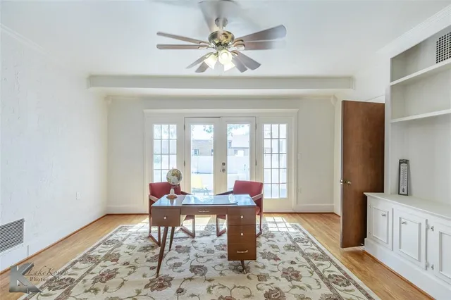 a dining room with table and chairs