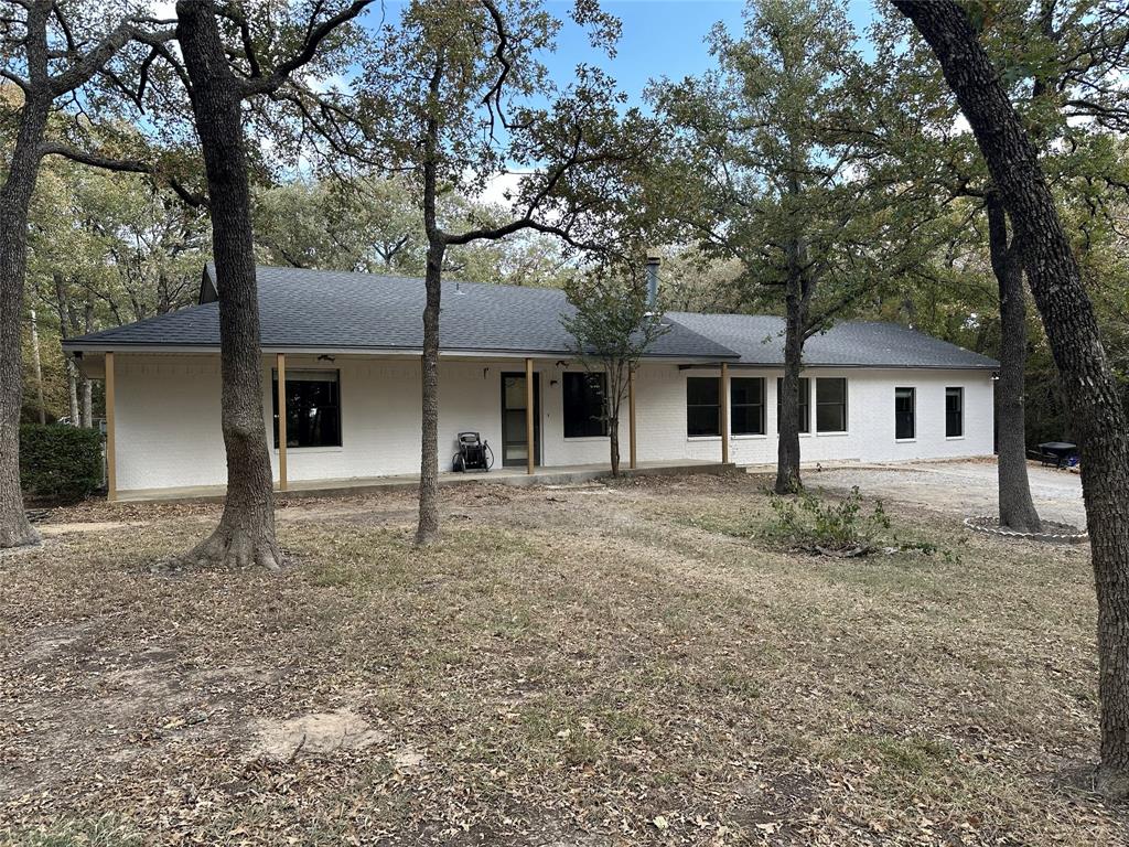2446 Neely Trail Valley View, TX 76272 - Photo 1 of 29 front view of a house with a trees