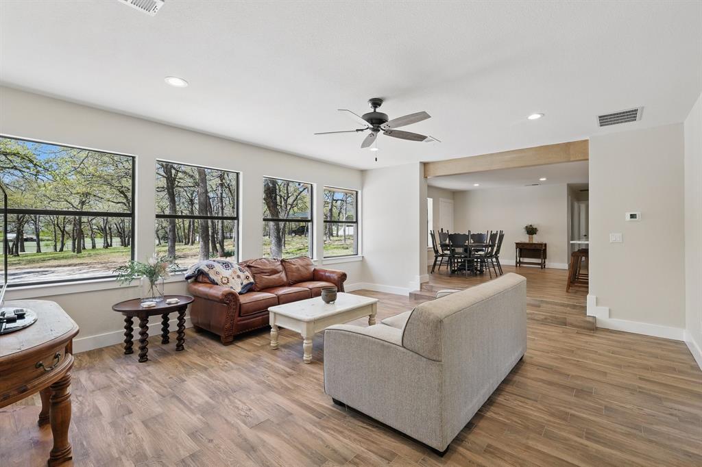 2446 Neely Trail Valley View, TX 76272 - Photo 11 of 29 a living room with furniture and a large window