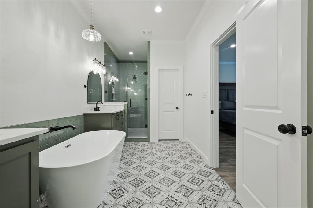 2446 Neely Trail Valley View, TX 76272 - Photo 19 of 29 a bathroom with a sink a toilet a mirror and shower