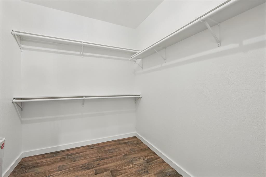 2446 Neely Trail Valley View, TX 76272 - Photo 20 of 29 a view of an empty walk in closet