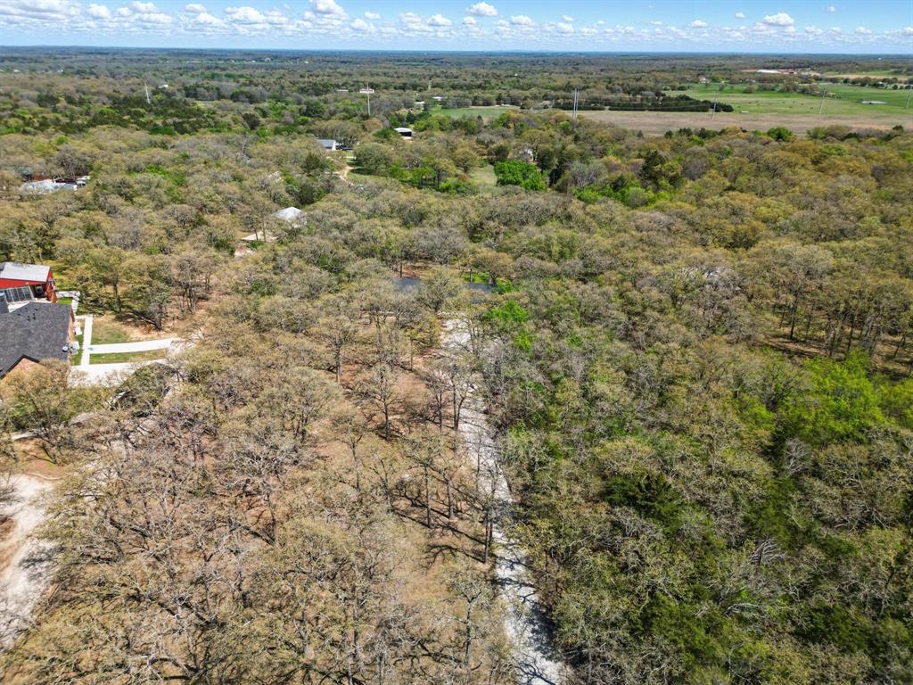 2446 Neely Trail Valley View, TX 76272 - Photo 29 of 29 a view of a yard with an outdoor space