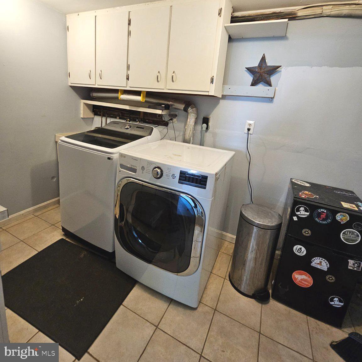 7433 Grace Street Springfield, VA 22150 - Photo 20 of 24 Functional laundry space with storage.