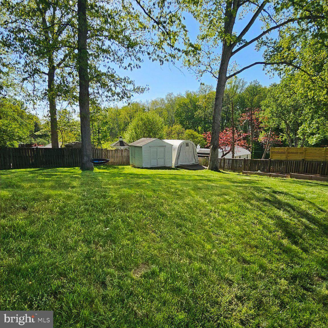 7433 Grace Street Springfield, VA 22150 - Photo 24 of 24 Spacious yard with serene greenery.