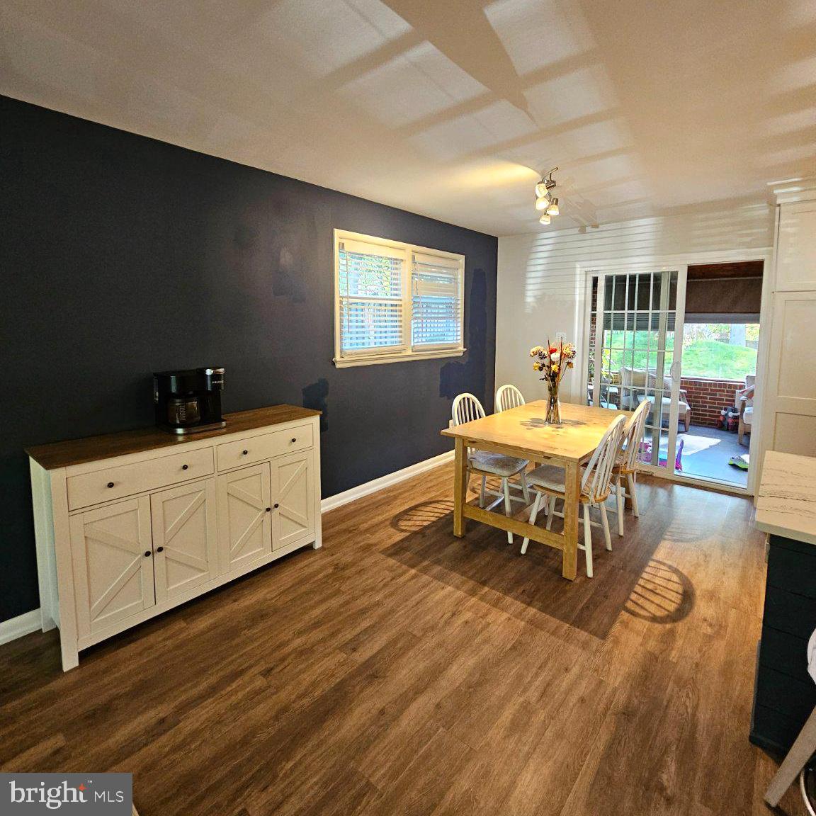 7433 Grace Street Springfield, VA 22150 - Photo 4 of 24 Charming dining space with modern flair.