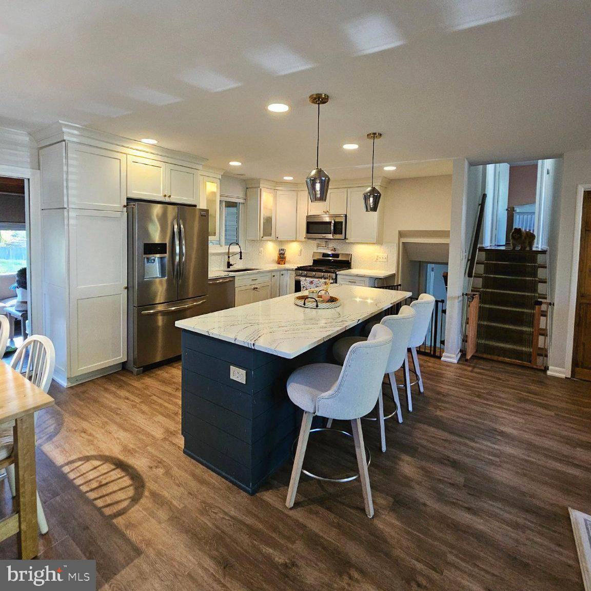 7433 Grace Street Springfield, VA 22150 - Photo 5 of 24 Modern kitchen with stylish island.