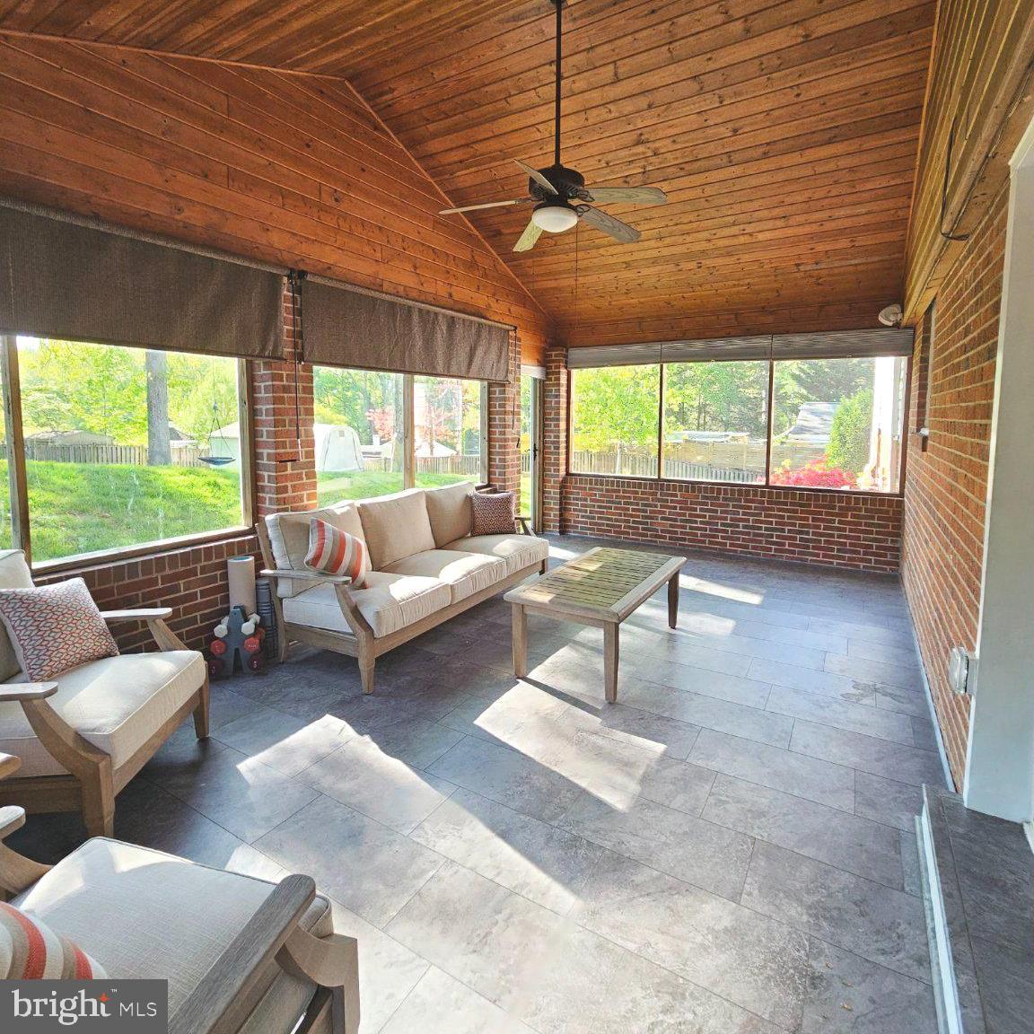 7433 Grace Street Springfield, VA 22150 - Photo 6 of 24 Serene sunlit retreat with nature views.