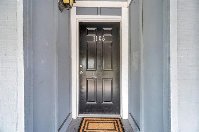 a view of an entryway with a door