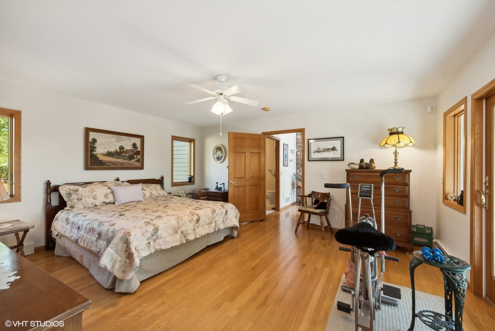 N3317 Schmidt Road Jefferson, WI 53549 - Photo 16 of 51 a bedroom with a bed and wooden floor