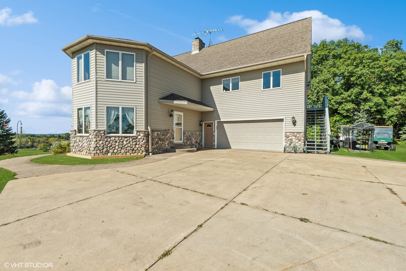 N3317 Schmidt Road Jefferson, WI 53549 - Photo 5 of 51 a front view of a house with a yard