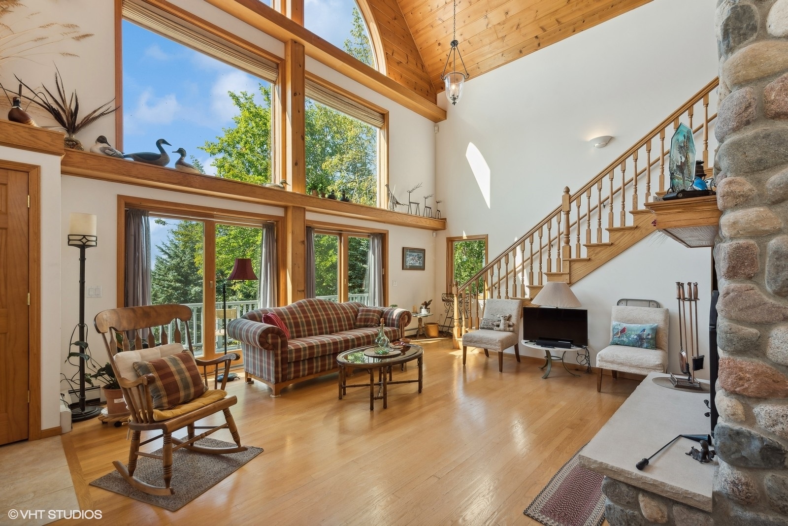 N3317 Schmidt Road Jefferson, WI 53549 - Photo 7 of 51 a livingroom with furniture water view and a floor to ceiling window