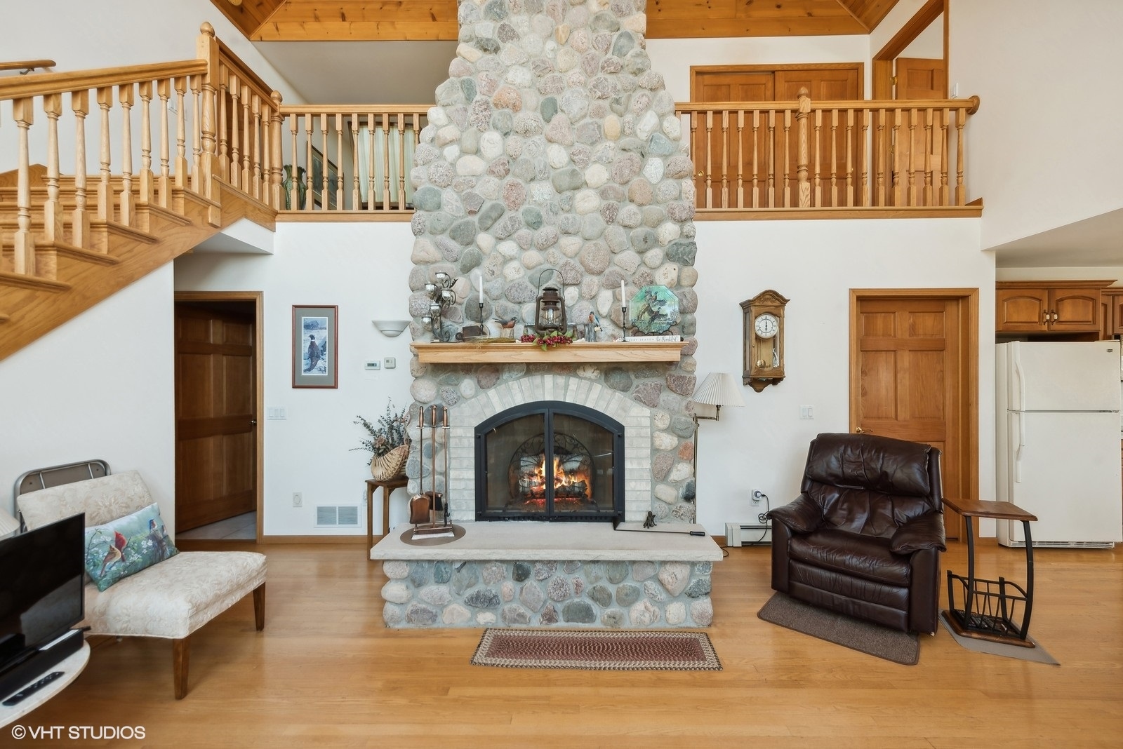 N3317 Schmidt Road Jefferson, WI 53549 - Photo 9 of 51 a living room with furniture and a fireplace