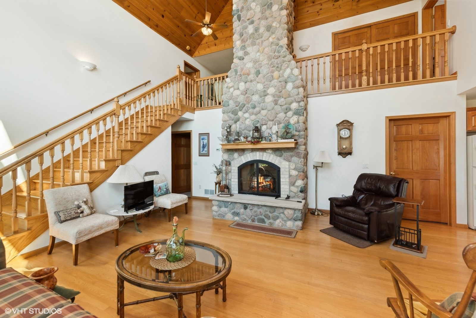 N3317 Schmidt Road Jefferson, WI 53549 - Photo 10 of 51 a living room with furniture and a fireplace