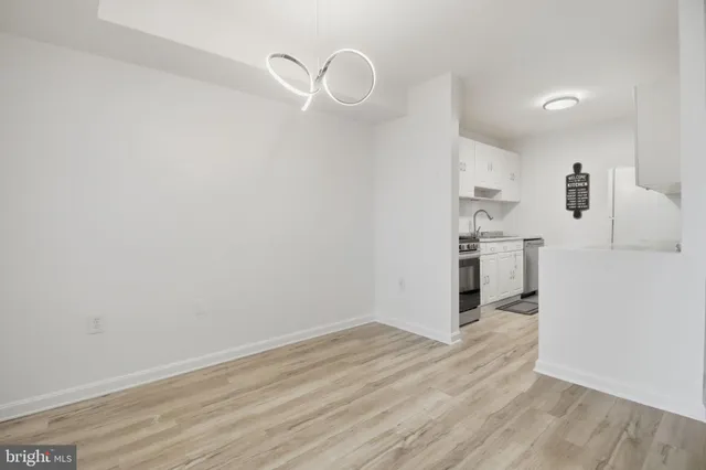 a view of kitchen with wooden floor