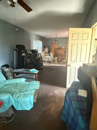 a living room with furniture and a window