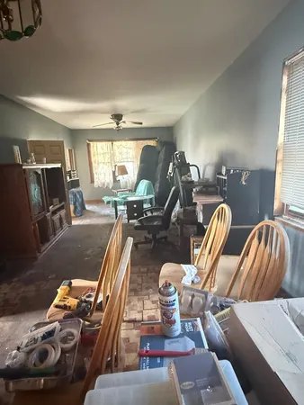 a living room with a couch and a table