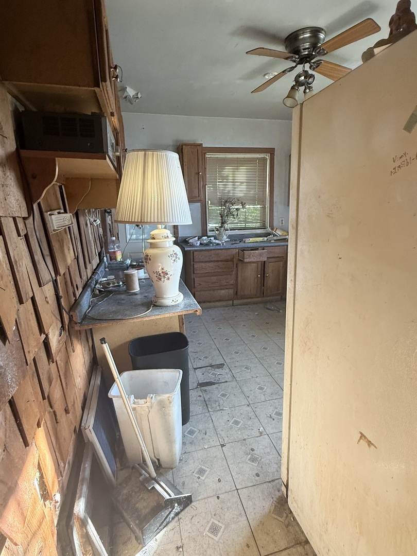 445 155th Place Calumet City, IL 60409 - Photo 8 of 14 a living room with a couch and a table