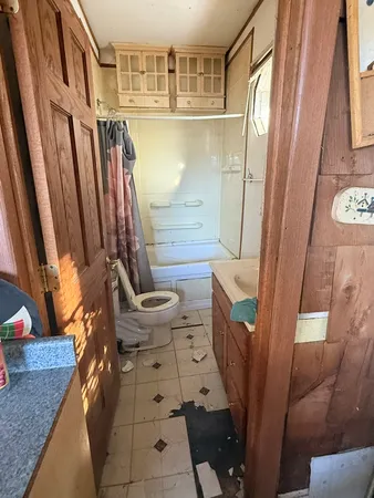 a kitchen with a sink and a stove