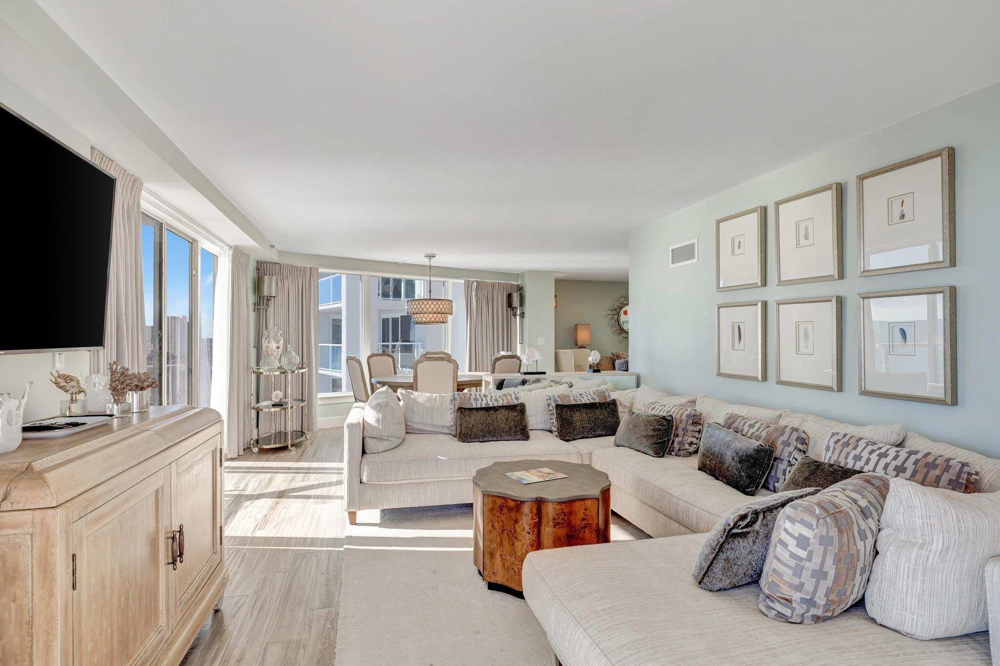4323 Beachside 2, Unit 323 Miramar Beach, FL 32550 - Photo 15 of 41 a living room with furniture and a flat screen tv