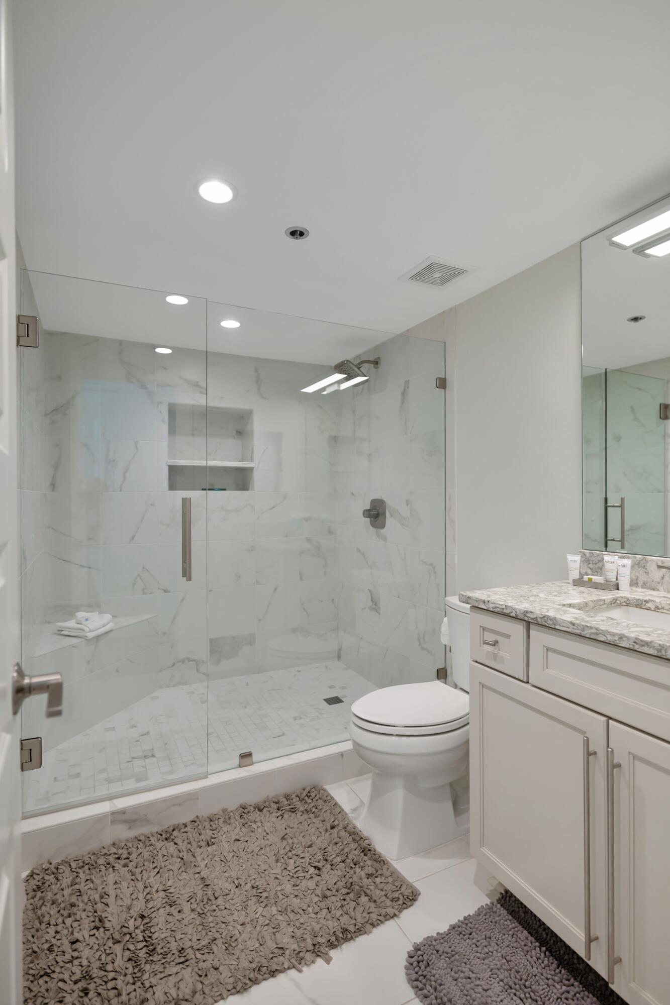 4323 Beachside 2, Unit 323 Miramar Beach, FL 32550 - Photo 20 of 41 a bathroom with a sink a toilet and shower