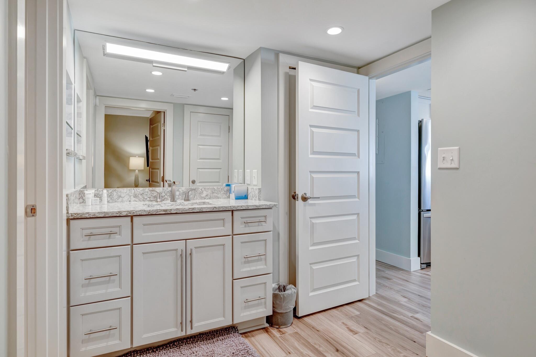 4323 Beachside 2, Unit 323 Miramar Beach, FL 32550 - Photo 25 of 41 a bathroom with a sink and a mirror