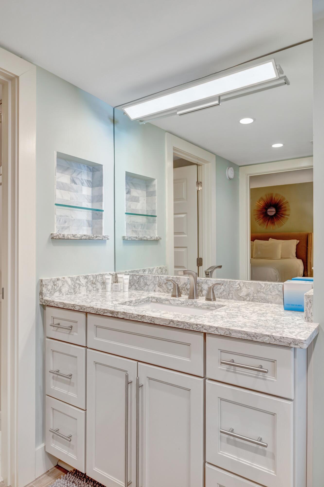 4323 Beachside 2, Unit 323 Miramar Beach, FL 32550 - Photo 26 of 41 a bathroom with a granite countertop sink mirror and double