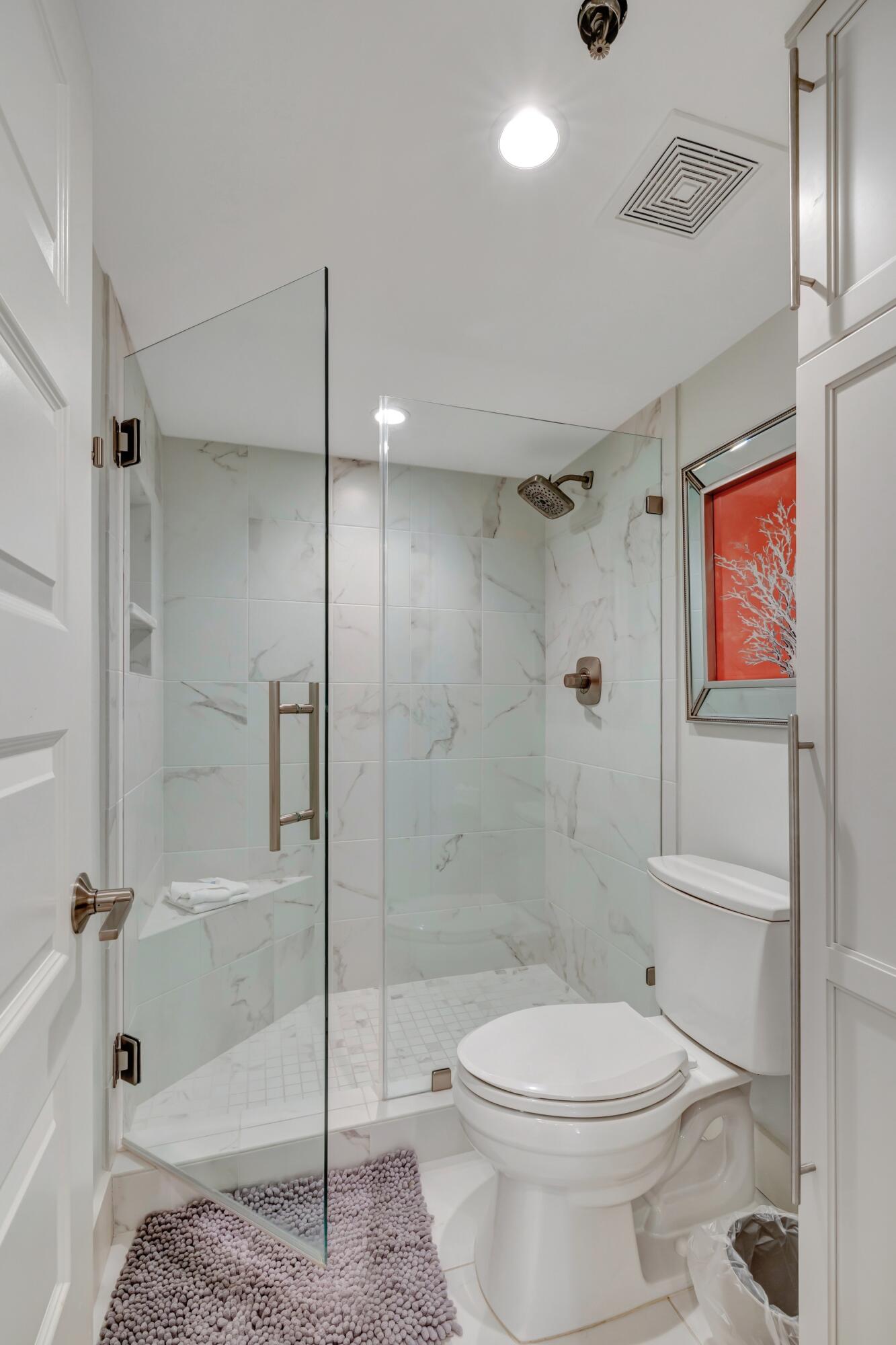 4323 Beachside 2, Unit 323 Miramar Beach, FL 32550 - Photo 27 of 41 a bathroom with a shower a toilet and a shower