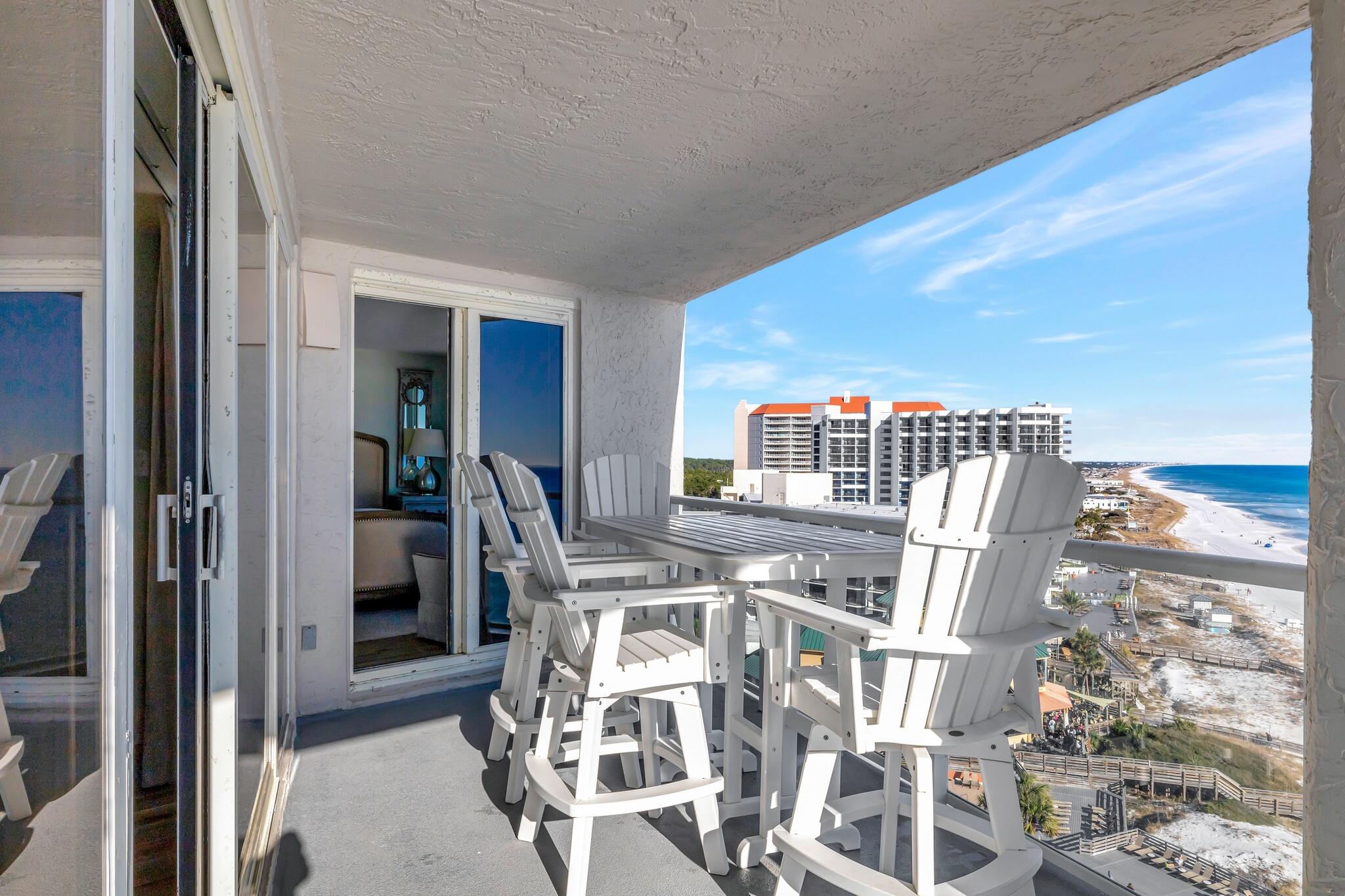 4323 Beachside 2, Unit 323 Miramar Beach, FL 32550 - Photo 29 of 41 a view of a dining room with furniture and chandelier