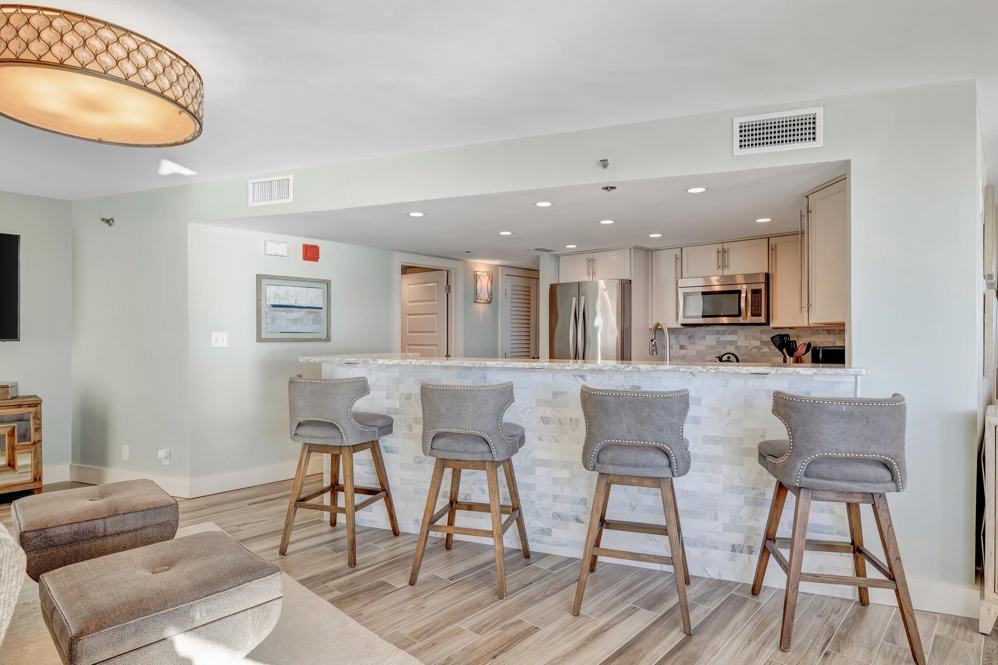 4323 Beachside 2, Unit 323 Miramar Beach, FL 32550 - Photo 9 of 41 a living room with furniture and a table