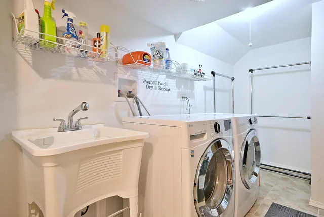 a utility room with dryer and washer