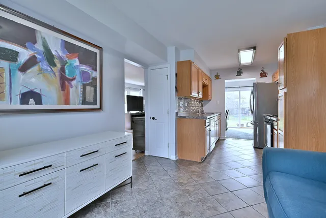 a kitchen with stainless steel appliances cabinets and a kitchen