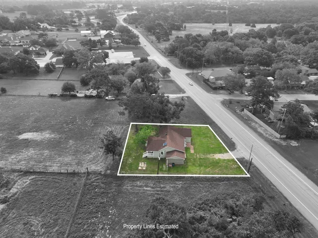a view of swimming pool with a yard