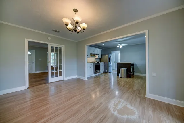 a view of an empty room with a window