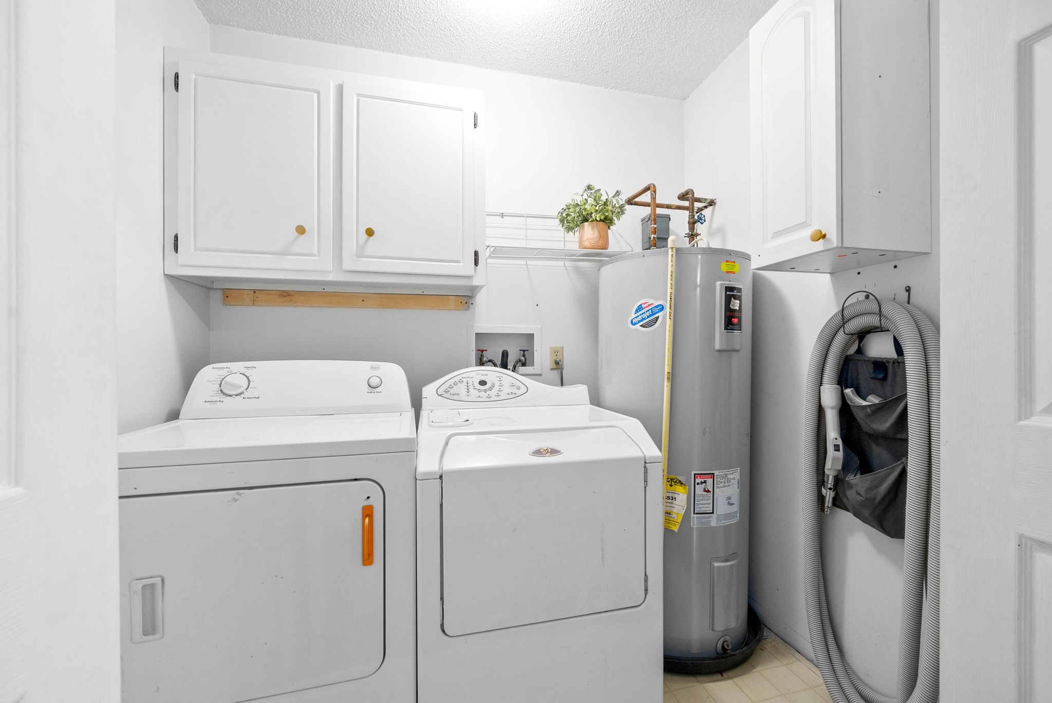 2946 Old Clarksville Springfield Road Adams, TN 37010 - Photo 16 of 45 a utility room with dryer and washer