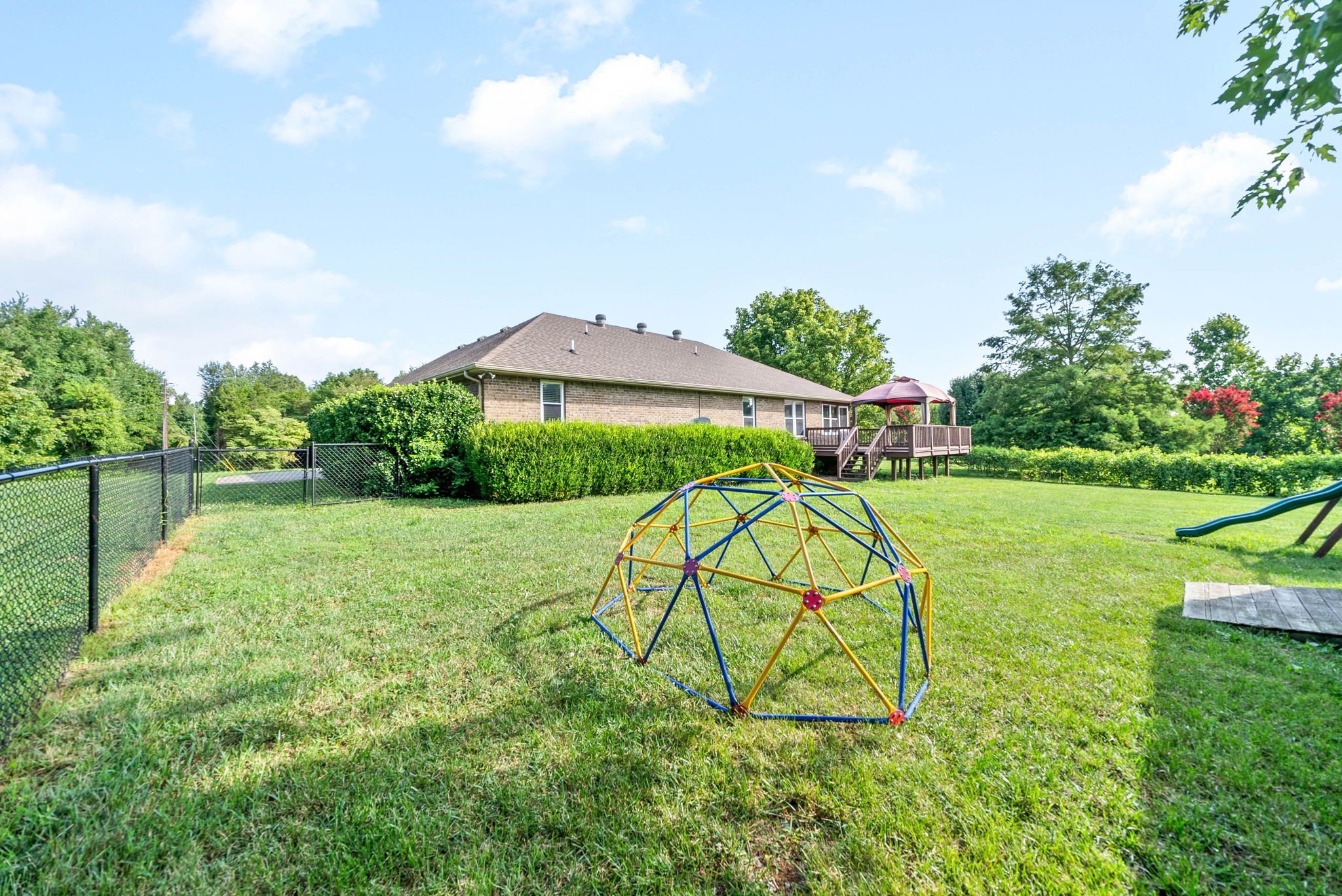 2946 Old Clarksville Springfield Road Adams, TN 37010 - Photo 36 of 45 a view of an house with backyard space and balcony