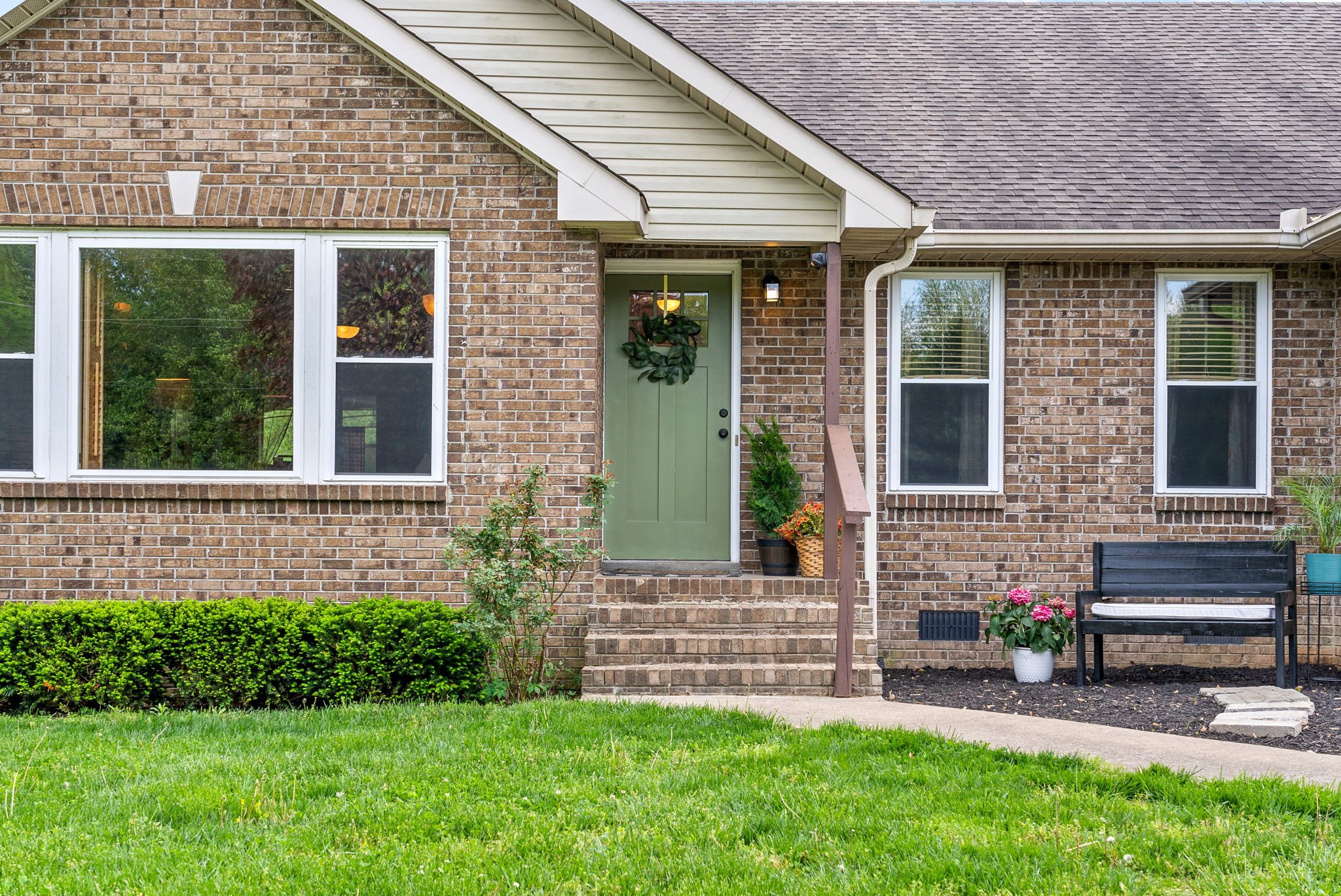 2946 Old Clarksville Springfield Road Adams, TN 37010 - Photo 45 of 45 a front view of a house with a garden