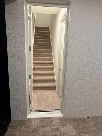 a large kitchen with a stove a sink and a refrigerator