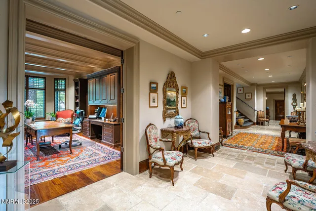 a living room with furniture and a rug