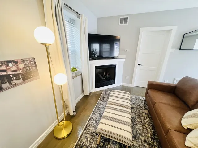 a view of kitchen with dining table and chairs