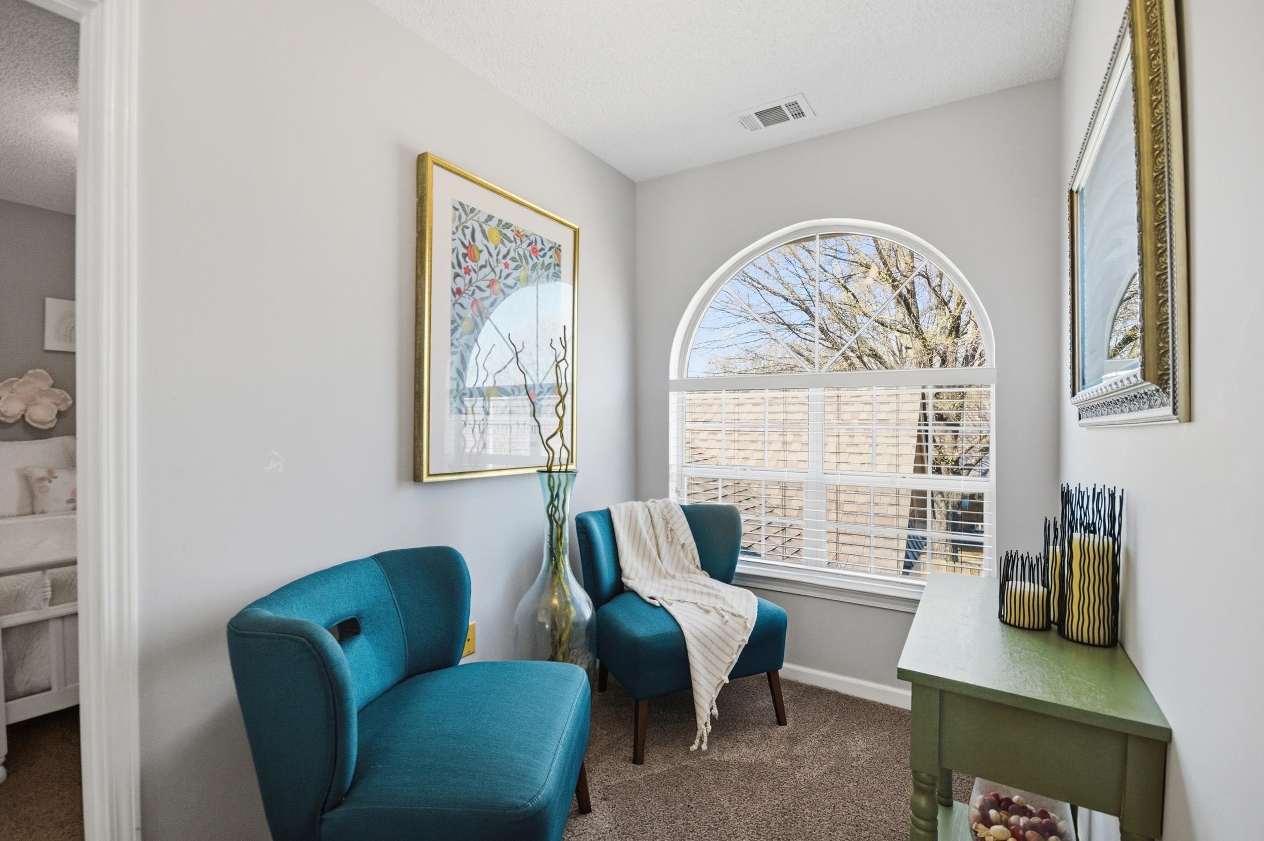 6605 Stephan Ridge Cove Bartlett, TN 38135 - Photo 24 of 30 Sitting room featuring dark carpet and baseboards