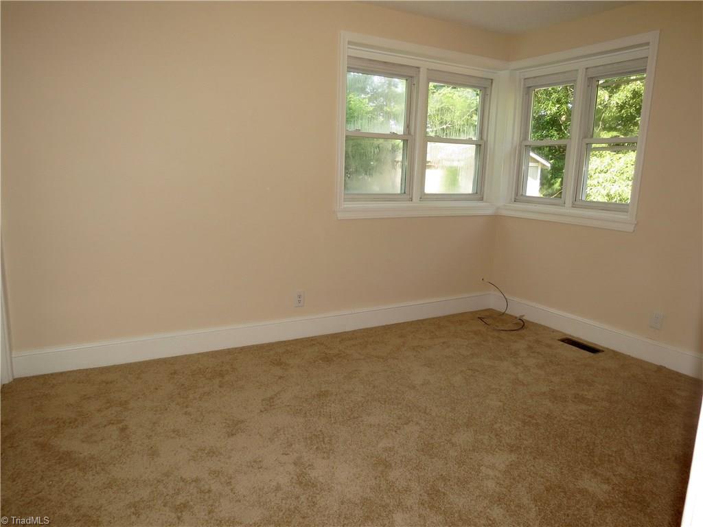 2092 Lick Fork Creek Road Ruffin, NC 27326 - Photo 4 of 10 Bedroom 1 with good size closet and new carpet and paint