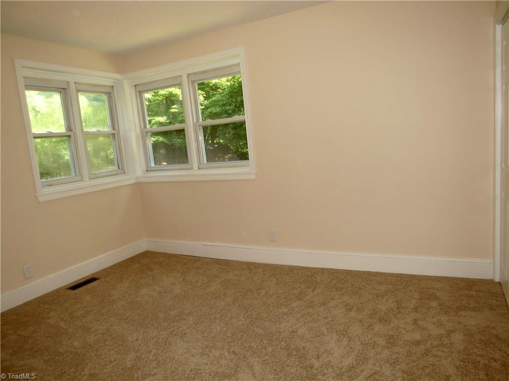 2092 Lick Fork Creek Road Ruffin, NC 27326 - Photo 5 of 10 Bedroom 2 with new carpet and paint