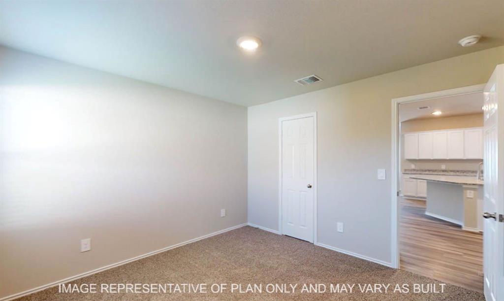 10204 Neptune Court Waco, TX 76708 - Photo 19 of 20 Neutral painted walls featuring a recessed ceiling light, carpeted flooring, and white trim