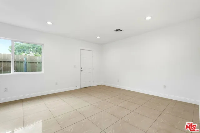 a view of an empty room with window