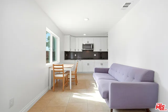 a living room with a couch and a coffee table
