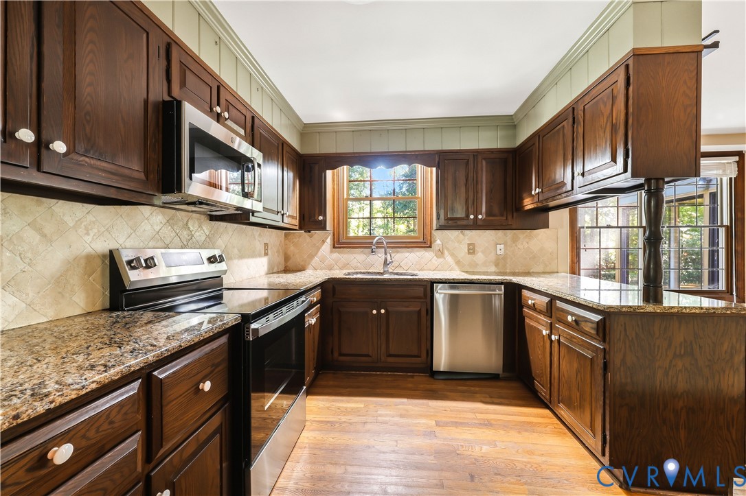 2725 Queenswood Road Midlothian, VA 23113 - Photo 9 of 17 Granite countertops and all appliances convey.