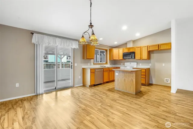 a very nice looking kitchen with a large window