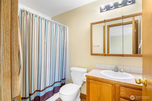 a view of a room with a air conditioner and a shower