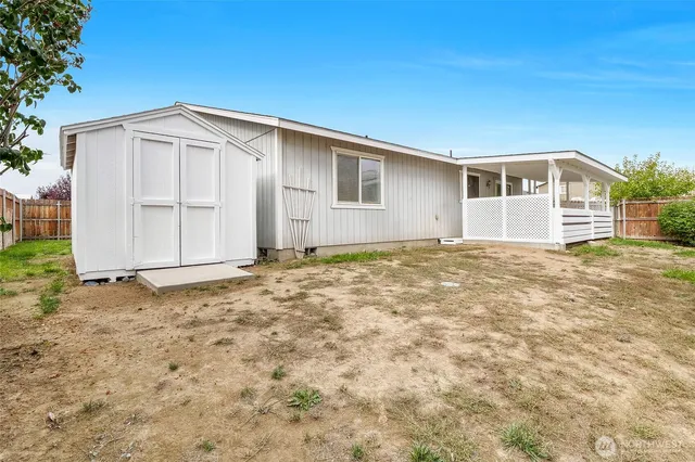 a view of backyard of house