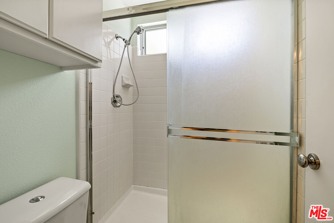 27050 Riversbridge Way Valencia, CA 91354 - Photo 16 of 37 a bathroom with a shower and a shower